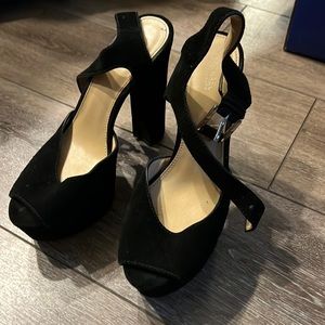Black suede peep goes platform heels